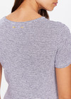 THE UPSIDE women's striped Pacey Stripe Tee is made from a hemp and organic cotton blend. The fitted baby style tee is designed with a contrast yellow arrow on the back for an elevated effect. Designed for light movement and recovery.