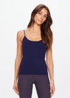THE UPSIDE women's navy Seamless Hailey Tank Top is made from recycled fabric. The seamless mini cable rib tank is form fitting with a shelf bra and bra cups for support and adjustable straps for the perfect fit. Designed for yoga, pilates and barre.