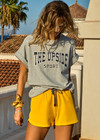 THE UPSIDE women's grey Harbor Sammi Tee is made from organic cotton. The oversized jersey is fitted with a rib neckline and navy logo on the front. Designed for all types of movement.