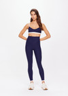THE UPSIDE women's navy Hamptons Ballet Bra is made from recycled soft peached fabrication with a brushed handfeel and a breathable, quick drying effect. The low coverage ballet bra features elastic straps with adjusters. Designed for yoga and pilates.