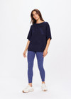 THE UPSIDE women's navy Knitted Sam Tee is made from linen. This oversized t-shirt featured THE UPSIDE logo at the front.