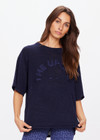 THE UPSIDE women's navy Knitted Sam Tee is made from linen. This oversized t-shirt featured THE UPSIDE logo at the front.