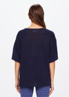 THE UPSIDE women's navy Knitted Sam Tee is made from linen. This oversized t-shirt featured THE UPSIDE logo at the front.