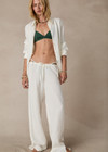 THE UPSIDE women's cream Desert House Party Pant is made from sandwash silk. The relaxed pant features drawstring waist. Designed for comfort and travel.