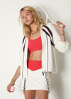 THE UPSIDE women's white Pacific Morgan Zip Jacket is made from organic cotton. The tennis jacket features pockets and drawstring. Designed for tennis and pickleball.