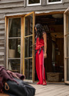 THE UPSIDE women's red Montana Freya Knit Pant is made from viscose blend. The straight pants features elastic waist and side stripe. Designed for lifestyle wear.