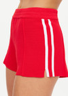 THE UPSIDE women's red Montana Bisou Knit Short is made from recycled fabric. The mid-rise shorts features knitted side stripes. Designed for lifestyle wear.