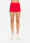 THE UPSIDE women's red Montana Bisou Knit Short is made from recycled fabric. The mid-rise shorts features knitted side stripes. Designed for lifestyle wear.