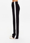 THE UPSIDE women's black Monte Pant is made from a lenzing viscose soft suiting fabrication. This high waisted wide leg pant features an elastic waistband, stripe tape down the side seams, and side seam and back patch pockets. Designed for leisure and recovery.