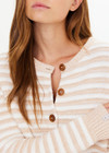 THE UPSIDE women's natural Canyon Isabeli Knit Cardigan is made from organic cotton. The buttoned up cardigan features ribbed hem, cuff and neck. Designed for lifestyle wear.