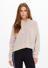 THE UPSIDE women's natural Dune Knit Hoodie is made from organic cotton. The relaxed fit hoodie features soft ribbed hem and cuffs. Designed for comfort.