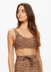 THE UPSIDE women's leopard Panthera Daisy Scoop Neck Bra is made from recycled peached. The supportive sports bra features removable cups. Designed for yoga.