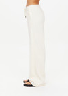 THE UPSIDE women's natural Bow n Arrow Nova Flare Pant is made from jacquard. The wide leg pant features drawstring and patch pocket. Designed for comfort.