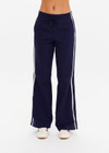 THE UPSIDE women's navy Muse Flare Pant is made from lenzing viscose. The side stripe pants features pockets and elastic waist. Designed for lounging and travel.