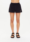 THE UPSIDE women's black Saddle Up Ziggy Short is made from hemp and cotton blend. The gym short features elastic waist and pockets. Designed for comfort.
