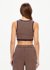 THE UPSIDE women's beige and navy geometric print Crossroad Alma Knit Crop Top is made with an organic cotton blend knit jacquard and features a scoop neckline.