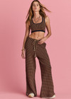 THE UPSIDE women's beige and navy geometric print Crossroad Alma Knit Crop Top is made with an organic cotton blend knit jacquard and features a scoop neckline.