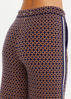 THE UPSIDE women's beige and navy geometric print Crossroad Juniper Knit straight leg Pant is made with organic cotton and feature pockets and a split hem.
