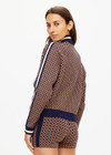 THE UPSIDE women's beige and navy geometric print Crossroad Margot Knit slim fit Jacket is made with an organic cotton jacquard and feature front welt pockets.