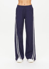 THE UPSIDE women's blue Juliet Pant is made from lyocell and cotton. The low-rise track pants features pockets and elastic waistband. Designed for lifestyle wear.