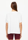 THE UPSIDE women's white Alumni Jodhi Tee is made with organic cotton jersey and is designed with a classic crew neck shape with a logo across the chest.