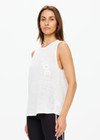 THE UPSIDE women's white Knitted Logo Tara Tank Top is made from linen. The relaxed tank top features embroidered logo. Designed for comfort.