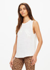 THE UPSIDE women's white Knitted Logo Tara Tank Top is made from linen. The relaxed tank top features embroidered logo. Designed for comfort.