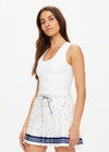 THE UPSIDE women's white Kori Scoop Neck Crop Tank is made from recycled peached. The high coverage sports tank top features removable cups. Designed for yoga, pilates and barre.