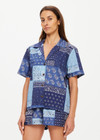 THE UPSIDE women's blue paisley Mascada Andie Shirt is made from tencel cotton. The button up shirt features tortoiseshell buttons. Designed for lifestyle wear.