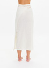 THE UPSIDE women's cream Beach Serenade Wrap Sarong is made from cotton. The beach sarong skirt features vegan leather braided belt. Designed for layering and travel.