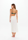 THE UPSIDE women's cream Beach Serenade Wrap Sarong is made from cotton. The beach sarong skirt features vegan leather braided belt. Designed for layering and travel.