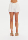 THE UPSIDE women's cream Hotel Du Cap Short is made from tencel linen blend. The elasticated waist short features drawstring. Designed for comfort and travel.