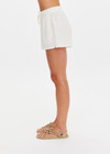 THE UPSIDE women's cream Hotel Du Cap Short is made from tencel linen blend. The elasticated waist short features drawstring. Designed for comfort and travel.