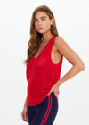 THE UPSIDE women's red Fenway Wales Knit Tank is made from organic cotton. The relaxed fit tank top features open knit and ribbed neckline. Designed for lifestyle wear.