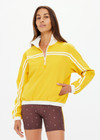 THE UPSIDE women's recycled fabric Prix Dawson Run Jacket in mimosa yellow is light and breathable whilst being water resistant and moisture wicking. Large back pocket with zip makes stow away and packing easy.
