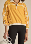 THE UPSIDE women's recycled fabric Prix Dawson Run Jacket in mimosa yellow is light and breathable whilst being water resistant and moisture wicking. Large back pocket with zip makes stow away and packing easy.