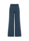 THE UPSIDE women's blue organic cotton Lumiere Dillon Knit Pant is designed for a relaxed fit and features a soft elasticated waist in a geometric star design. Made for lifestyle.