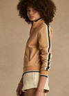 THE UPSIDE women's yellow Le Sport Margot Zip Jacket is designed for a slim fit and features pockets and textured knit side tapes. Perfect for travel and everyday.