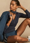 THE UPSIDE women's blue organic cotton Lumiere 3 Inch Knit Short is a mid rise comfortable fit and features a soft elasticated waistband in a geometric star design. Made for lifestyle.