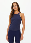 THE UPSIDE women's navy organic cotton Asher Racerback Tank Top is designed for a slim fit and features a racerback shape and high neckline. Ideal for layering & pilates.
