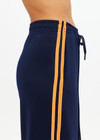THE UPSIDE women's navy Vitesse Marnie Wide Leg Pant in slinky fabrication featuring a high rise elasticated waistband, drawcord and side seam pockets. Ideal for everyday leisure.