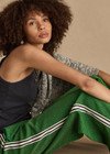 THE UPSIDE women's green Galaxia Loretta Pant is designed for a mid to low rise straight leg fit and features elasticated waistband, drawcord and side seam pockets. Made for lifestyle.