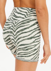 THE UPSIDE women's green Reversible 5inch Spin Short is designed for a soft & supportive fit in a recycled fabric and features embroidered arrow logo on back. Made for yoga & pilates.