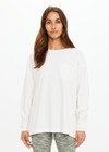 THE UPSIDE women's cream recycled cotton Soho Cara Long Sleeve Top is designed for a relaxed fit and features a ribbed neck and cuffs and a patch pocket at front. Made for everyday leisure.