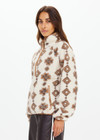 THE UPSIDE women's beige recycled fleece fabrication Harlow Fleece Pullover is a relaxed pullover style with quarter zip through and zip pockets.