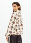 THE UPSIDE women's beige recycled fleece fabrication Harlow Fleece Pullover is a relaxed pullover style with quarter zip through and zip pockets.
