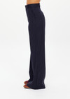 THE UPSIDE women's navy pinstripe merino Wool Mira Wide Leg Pant features a flat waistband with belt loops and side pockets.