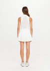 THE UPSIDE women's white Slam Pleated Tennis Dress features a quarter zip opening with mock neck, a pleated light-weight skirt with built-in inner short with pockets. Made for tennis.