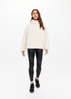 THE UPSIDE women's natural Harlow Fleece Pullover offers a relaxed fit made from recycled warm fleece fabric and features zip pockets and an elastic at waist and cuffs to keep warmth in. Made for lifestyle.