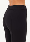 THE UPSIDE women's black Bonnie Kick Flare Pant is designed for a slim fit in a thick, ponte fabrication and features a soft, elasticated waistband. Perfect for everyday.
